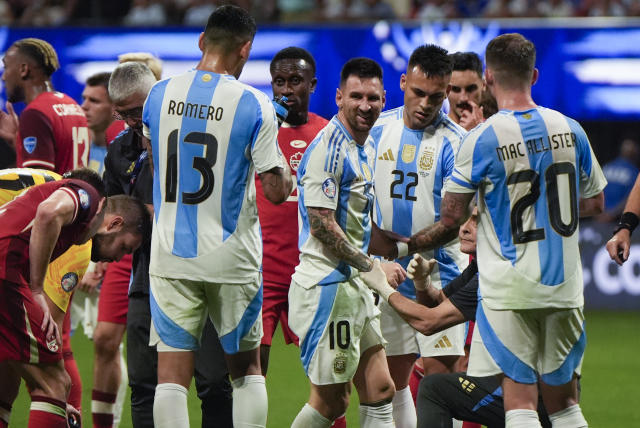 Messi and Argentina overcome Canada and poor surface, start Copa America title defense with 2-0 win.jpeg